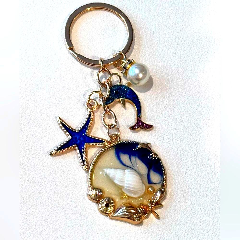 BAG CHARM Charming Seashell Keychain with Starfish and Shell Charms NIP